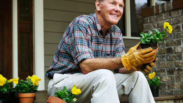 Man holding plant